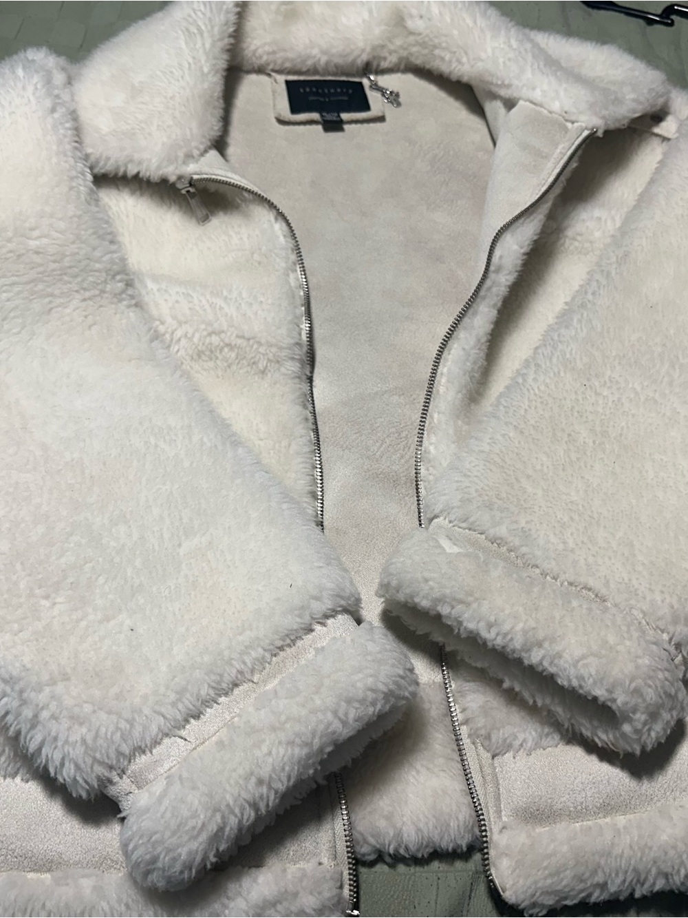 White faux fur coat